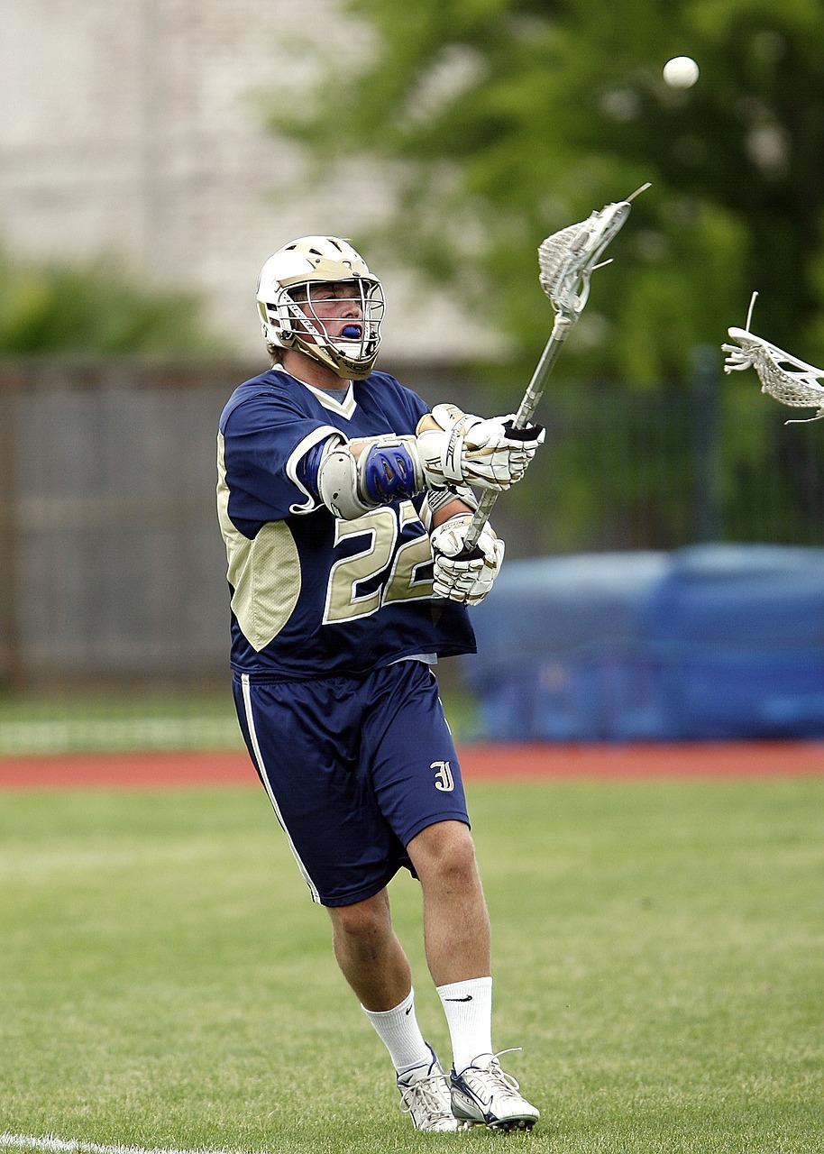 lacrosse player ball free photo