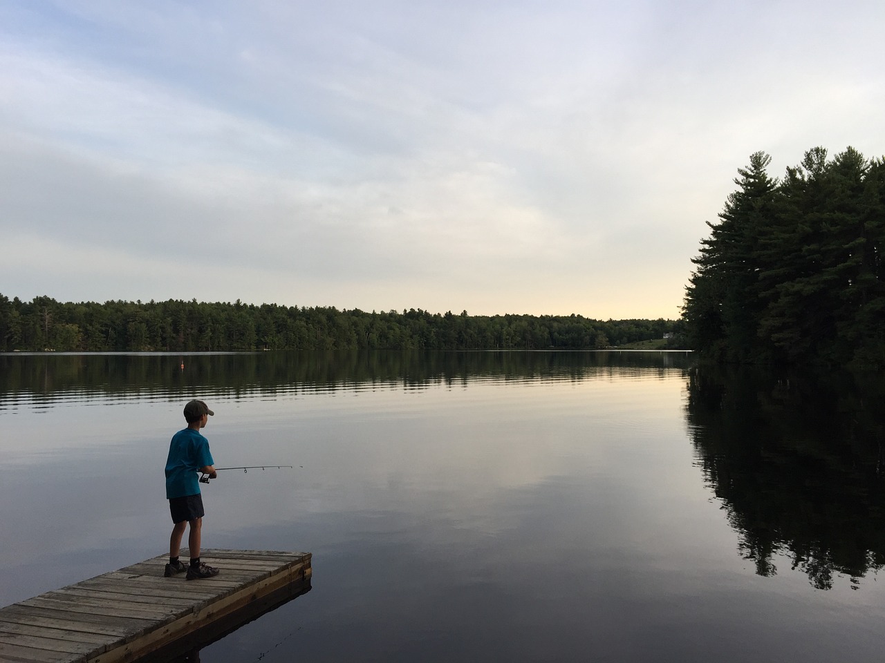 lake boy fishing free photo