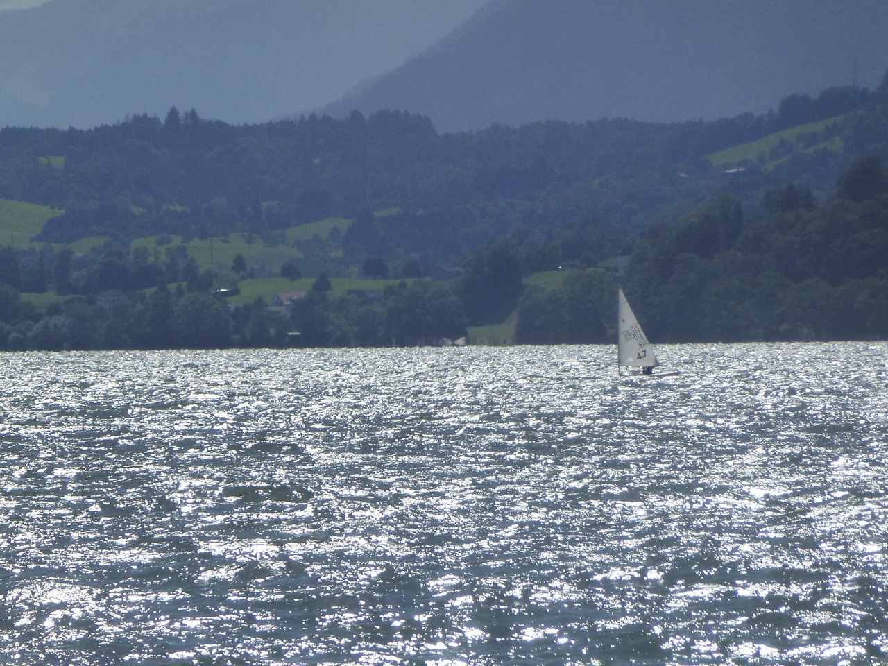 lake sailing vessel landscape free photo