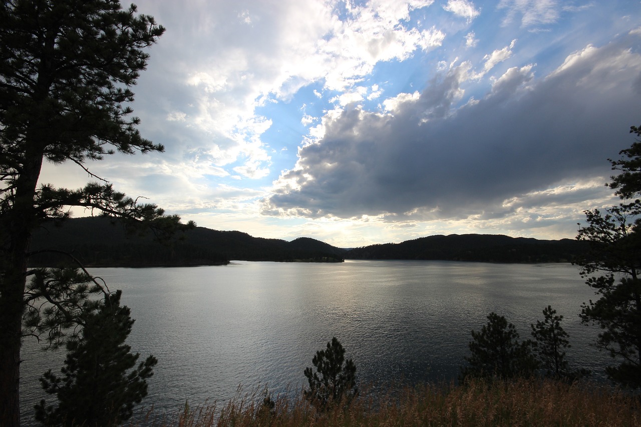 lake sunset clouds free photo