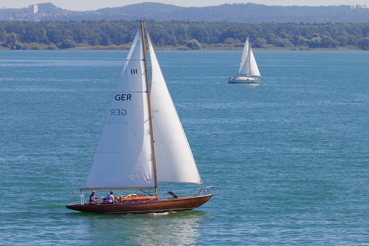 lake sailing vessel wind free photo