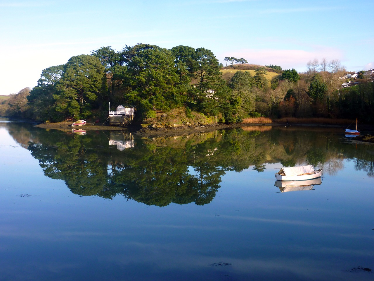 lake mirroring water free photo