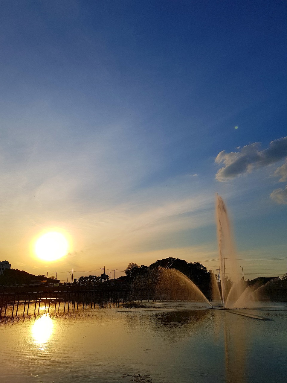 lake sunset fountain free photo