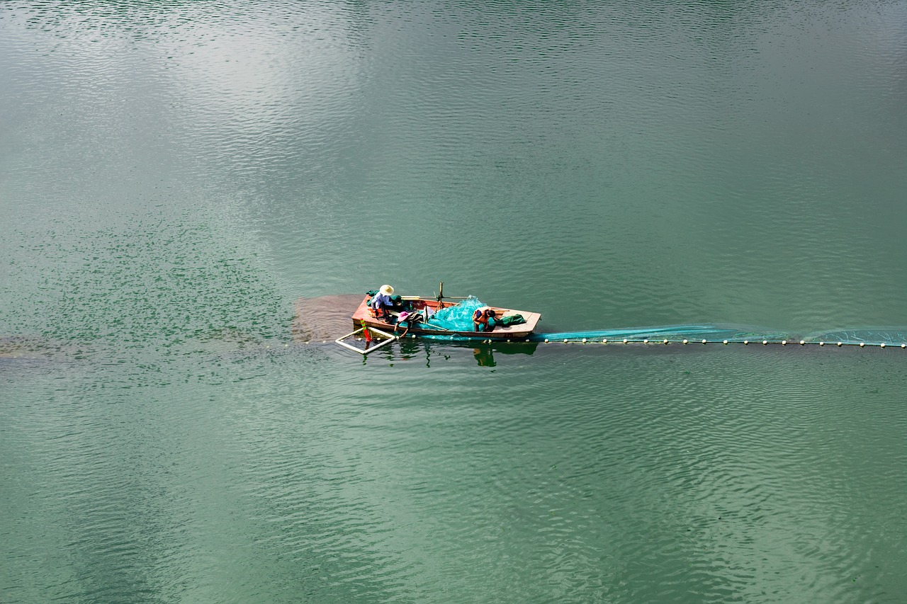 lake  fishermen  boat free photo