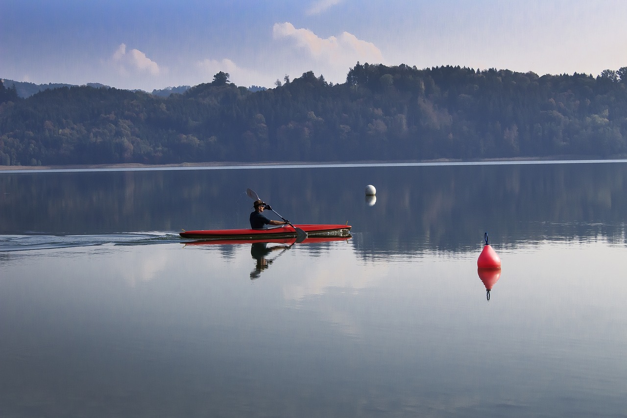 lake  kayak  clouds free photo