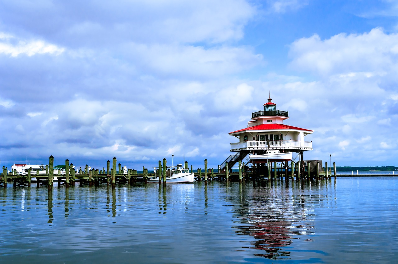 lake  lighthouse  sky free photo