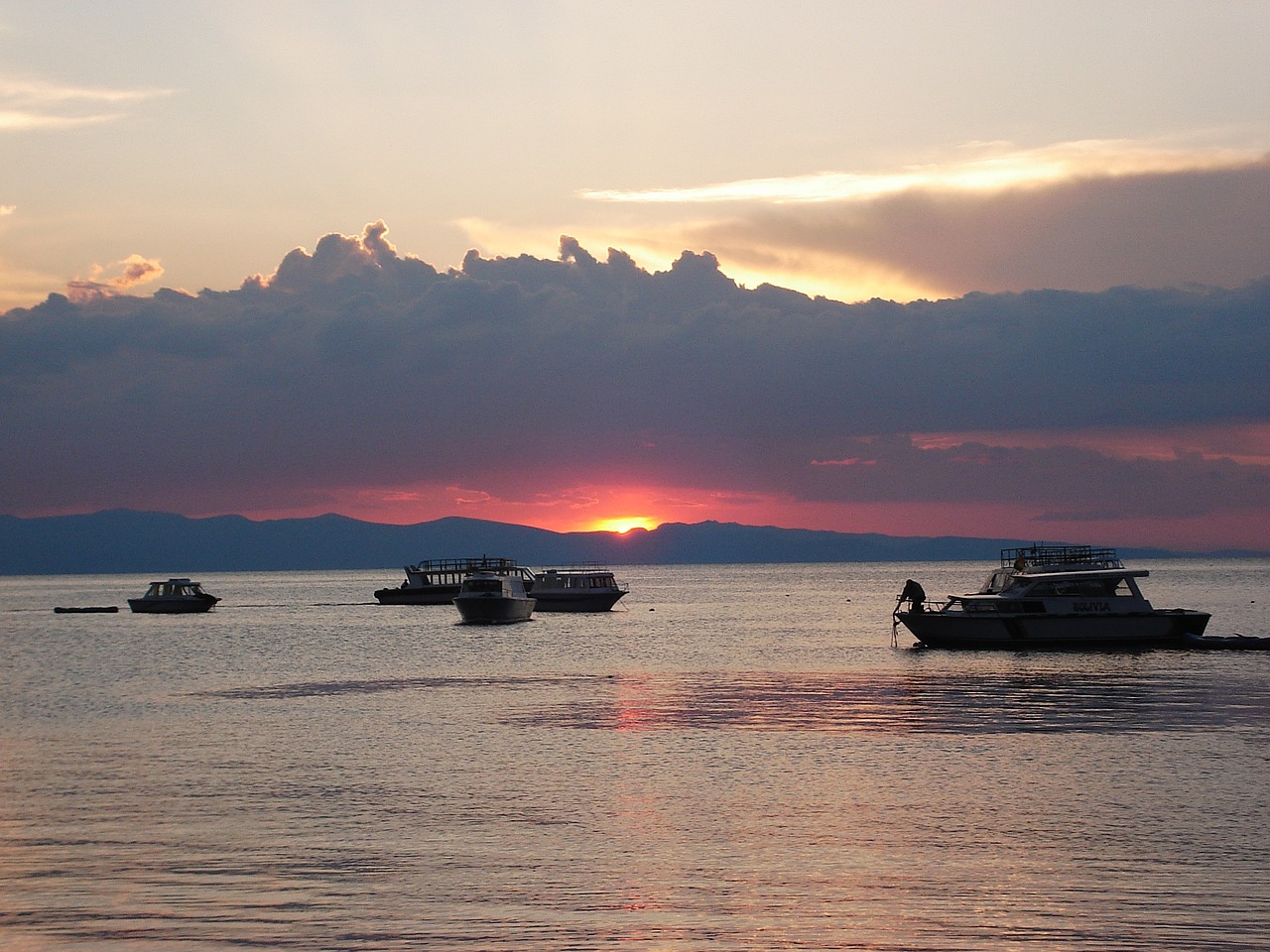 lake boats sunset free photo