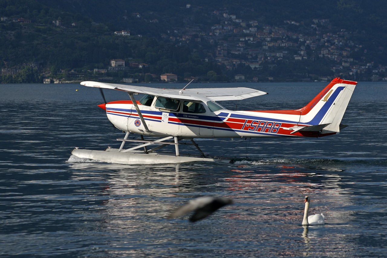 lake como flying aircraft free photo