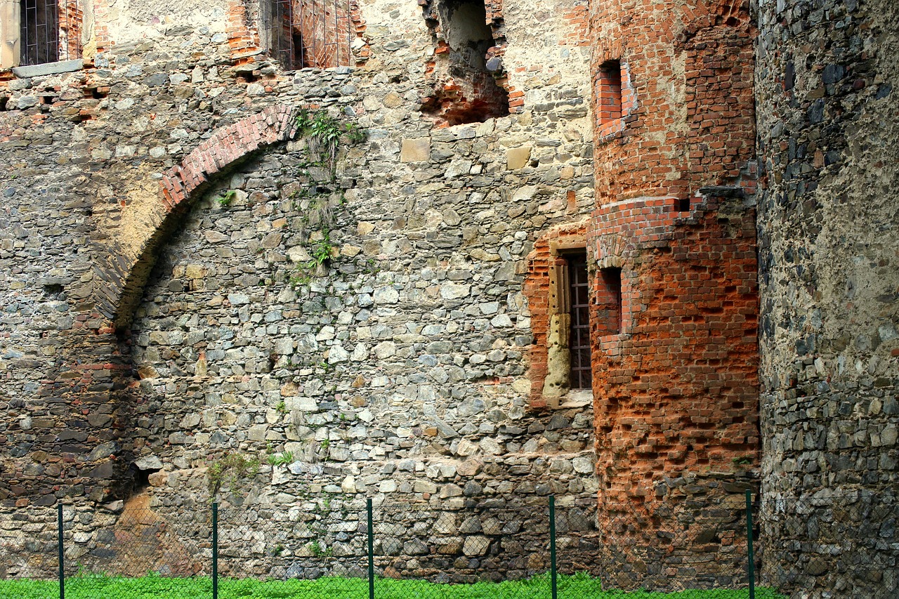 lake dusia  castle ruins  stone wall free photo