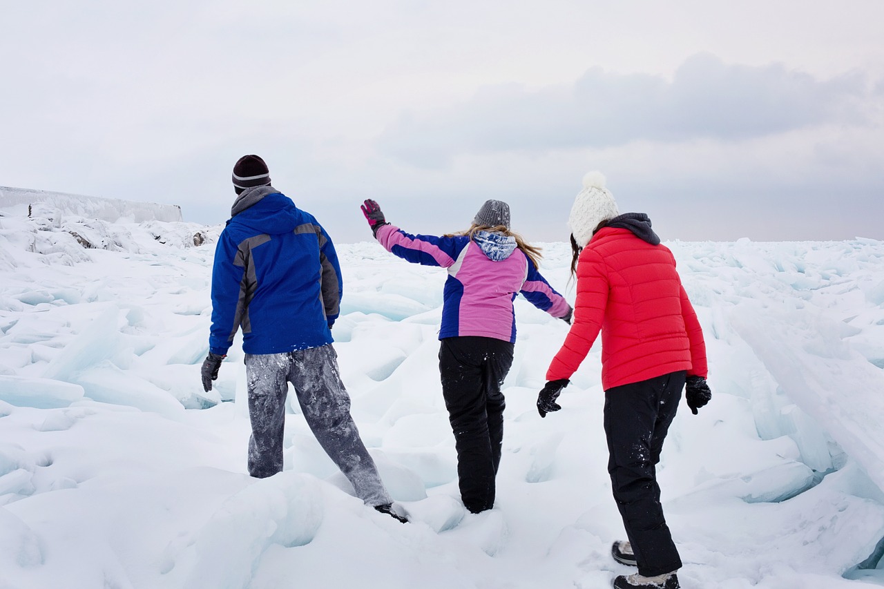 lake huron frozen people free photo