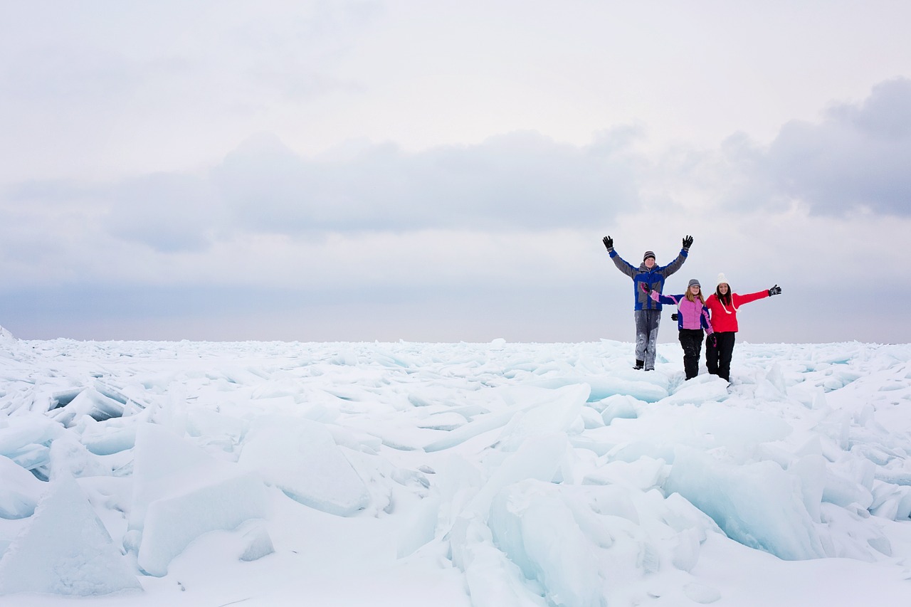 lake huron frozen people free photo