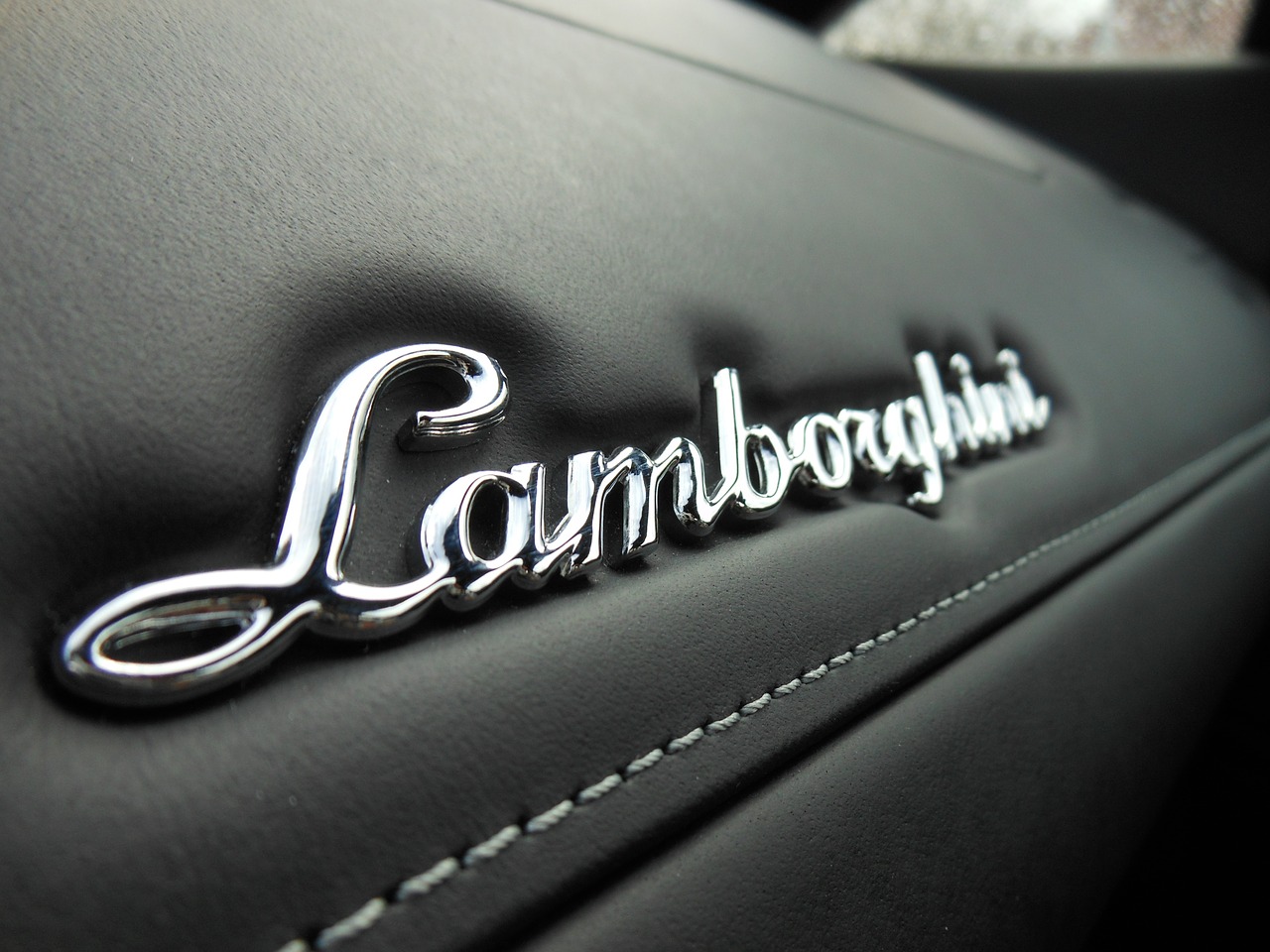 lamborghini lettering emblem free photo