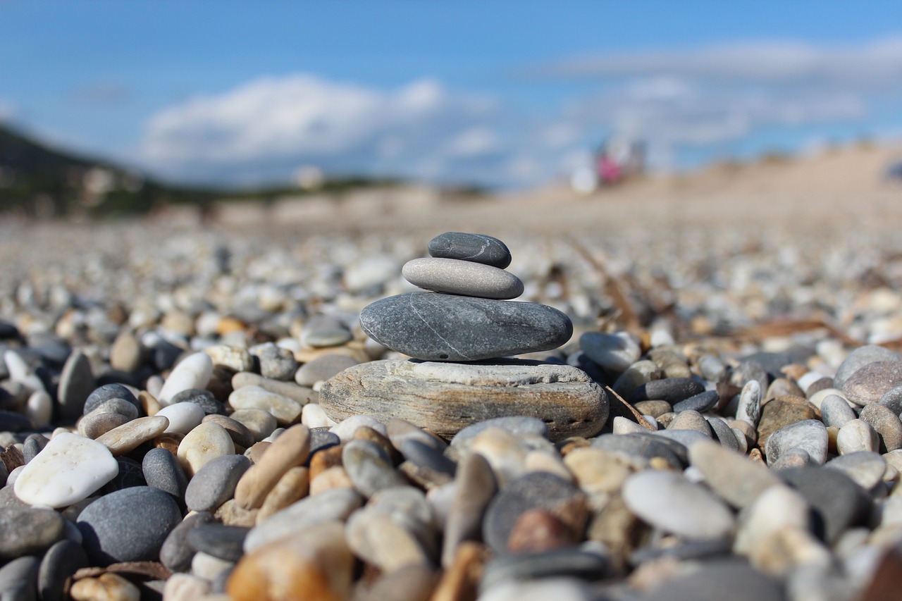 land art beach pebble free photo