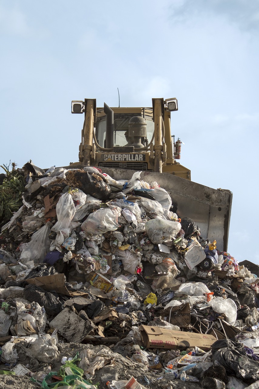 landfill bulldozer garbage free photo