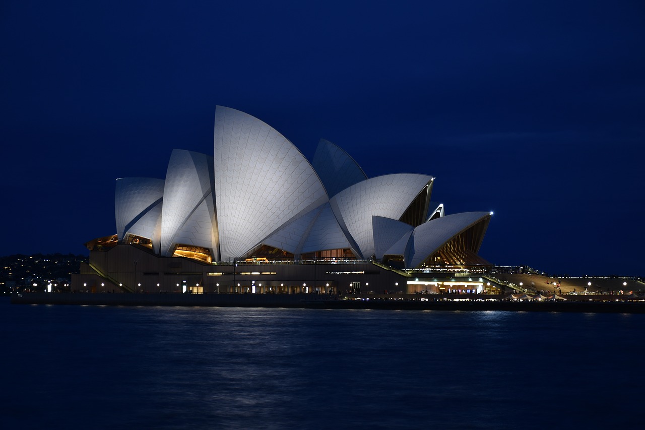 landmark sydney opera house dark blue sky free photo