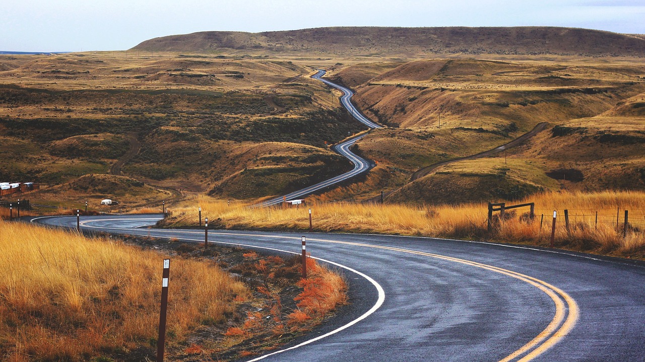 landscape winding road fields free photo