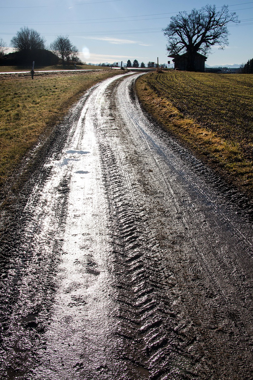 lane tire tracks puddles free photo