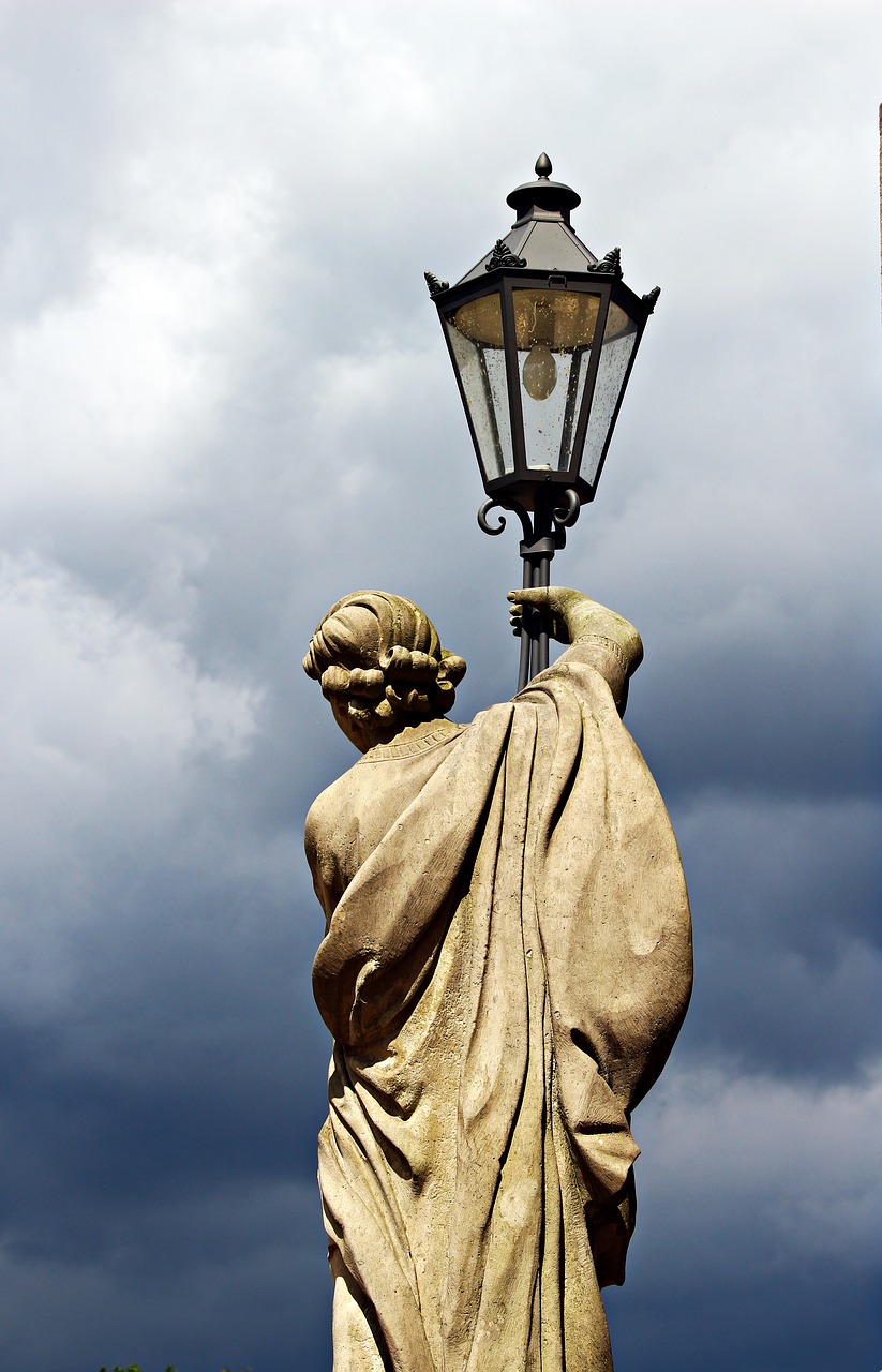 lantern carriers statue sculpture free photo