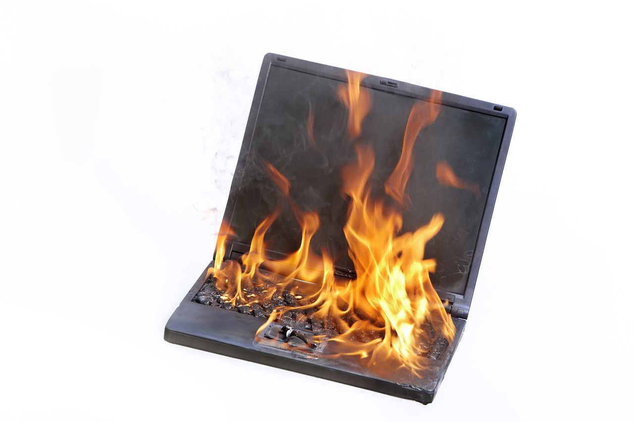 laptop burning fire free photo