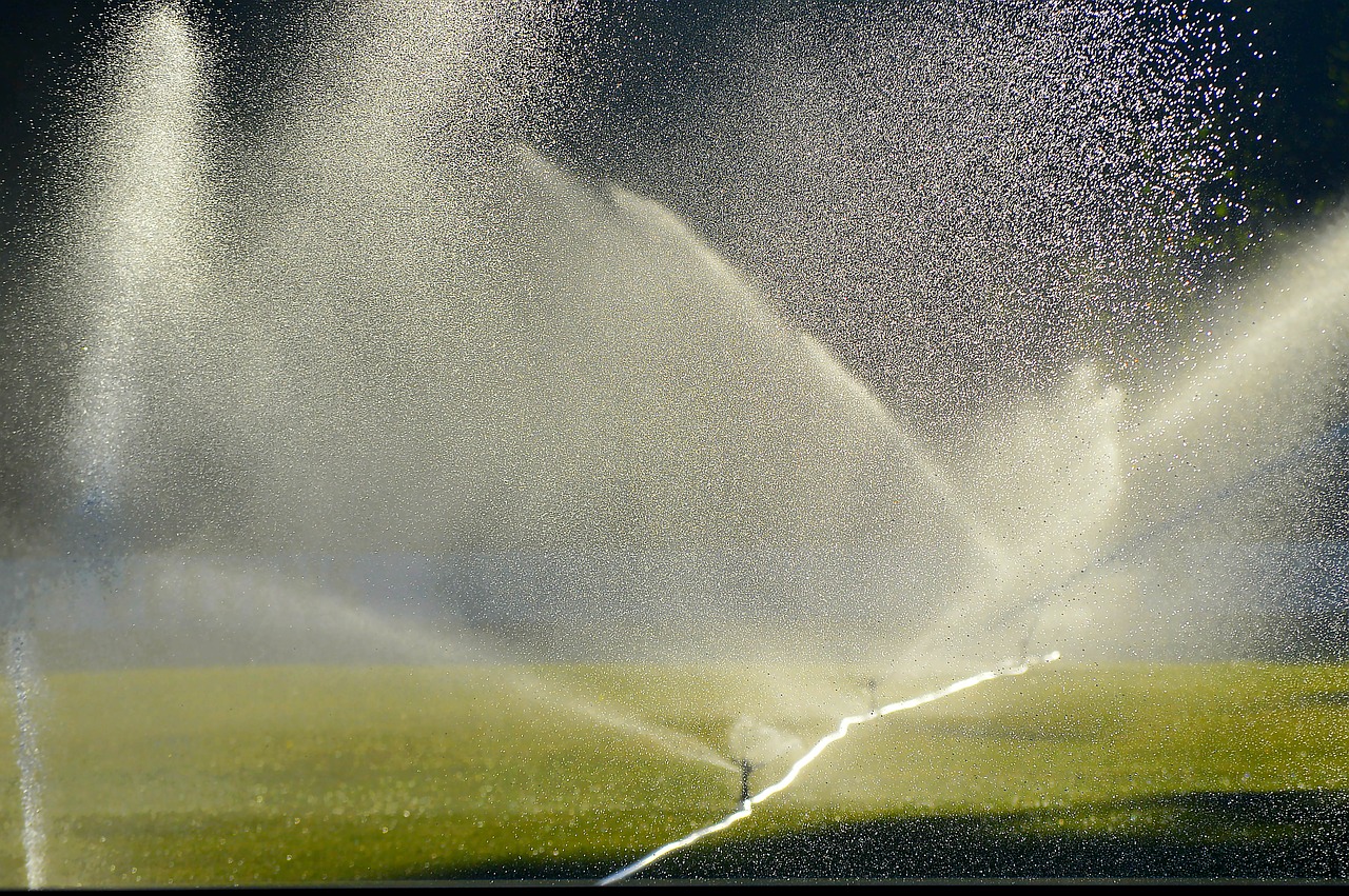 lawn irrigation sprinkler football pitch free photo