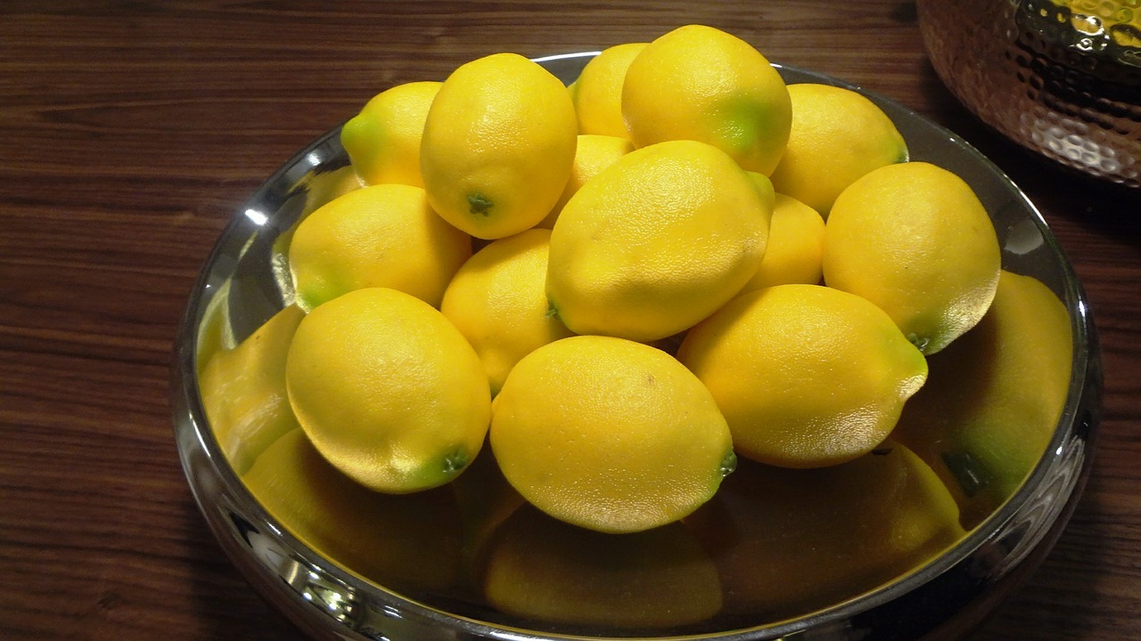 lemons fruit basket fruit bowl free photo