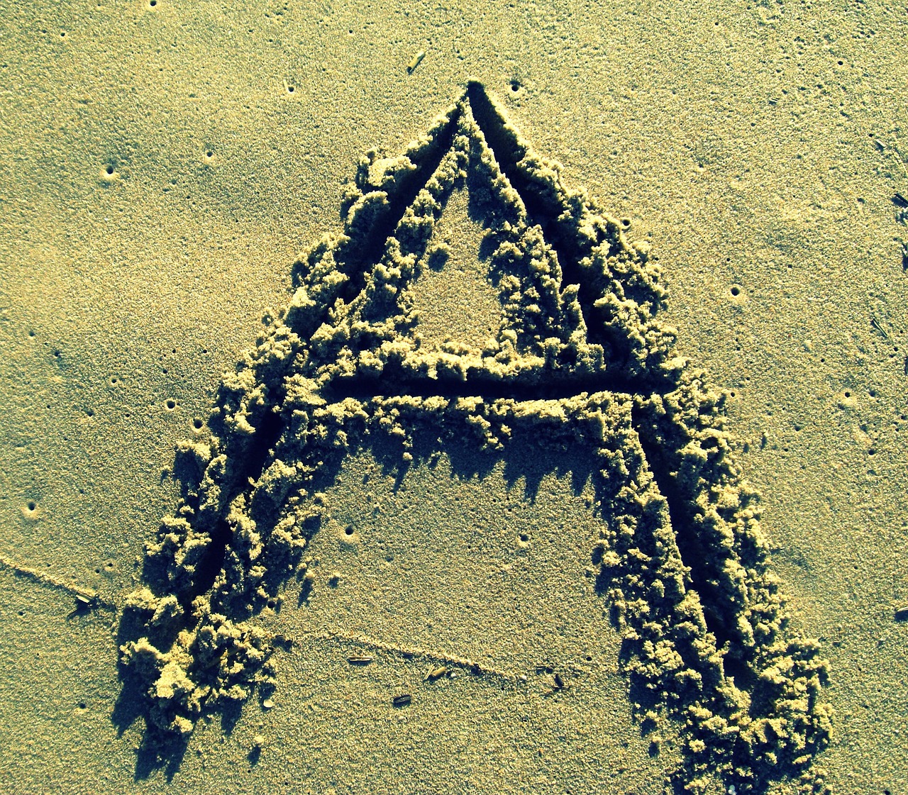 letter a sand stick free photo