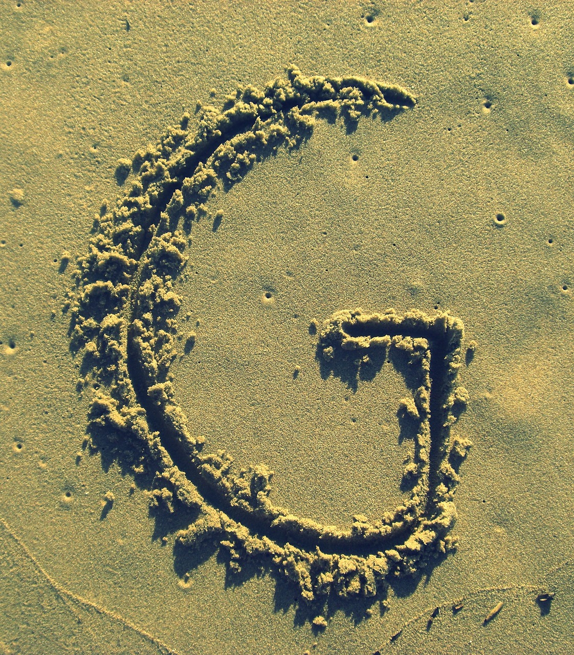 letter g sand stick free photo