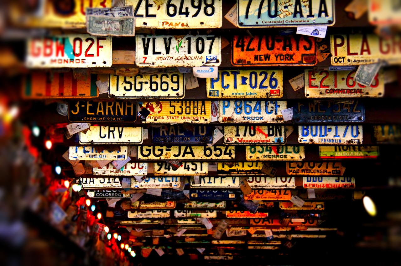 license plates  ceiling  bar free photo