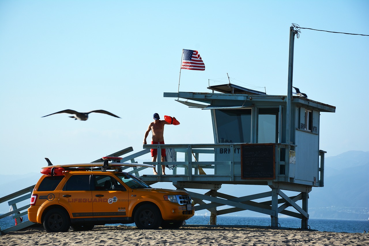 lifeguard  yellow  beach free photo