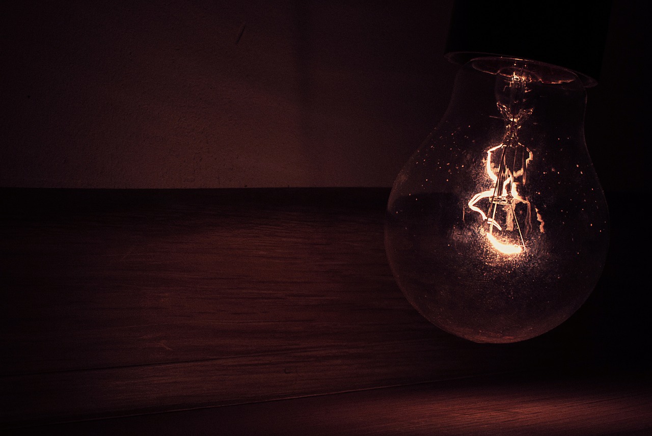 light bulb electricity dark free photo