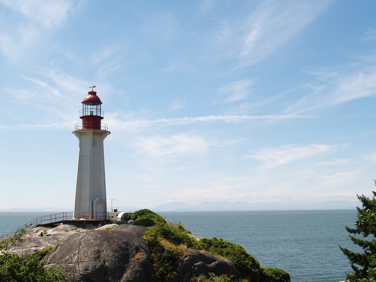 light house sky ocean free photo