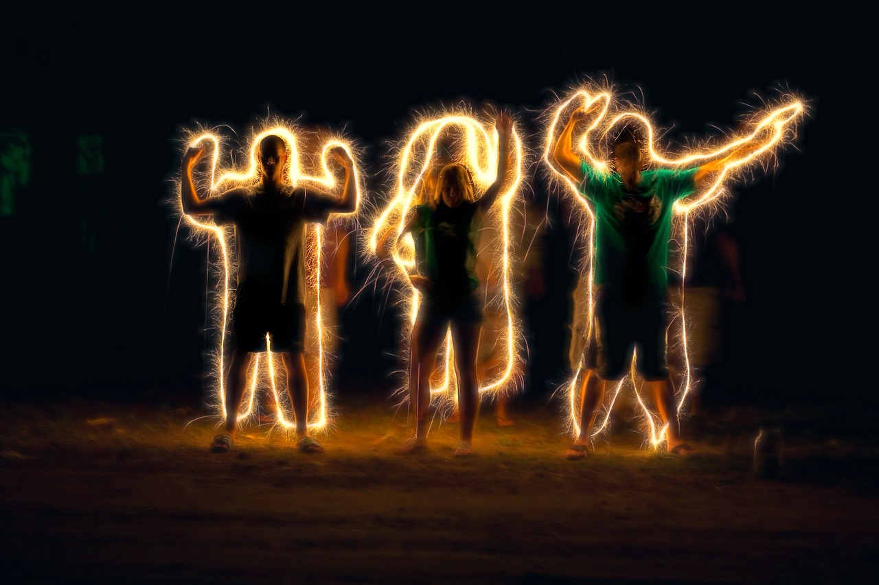 light painting sparkler writing people outline free photo