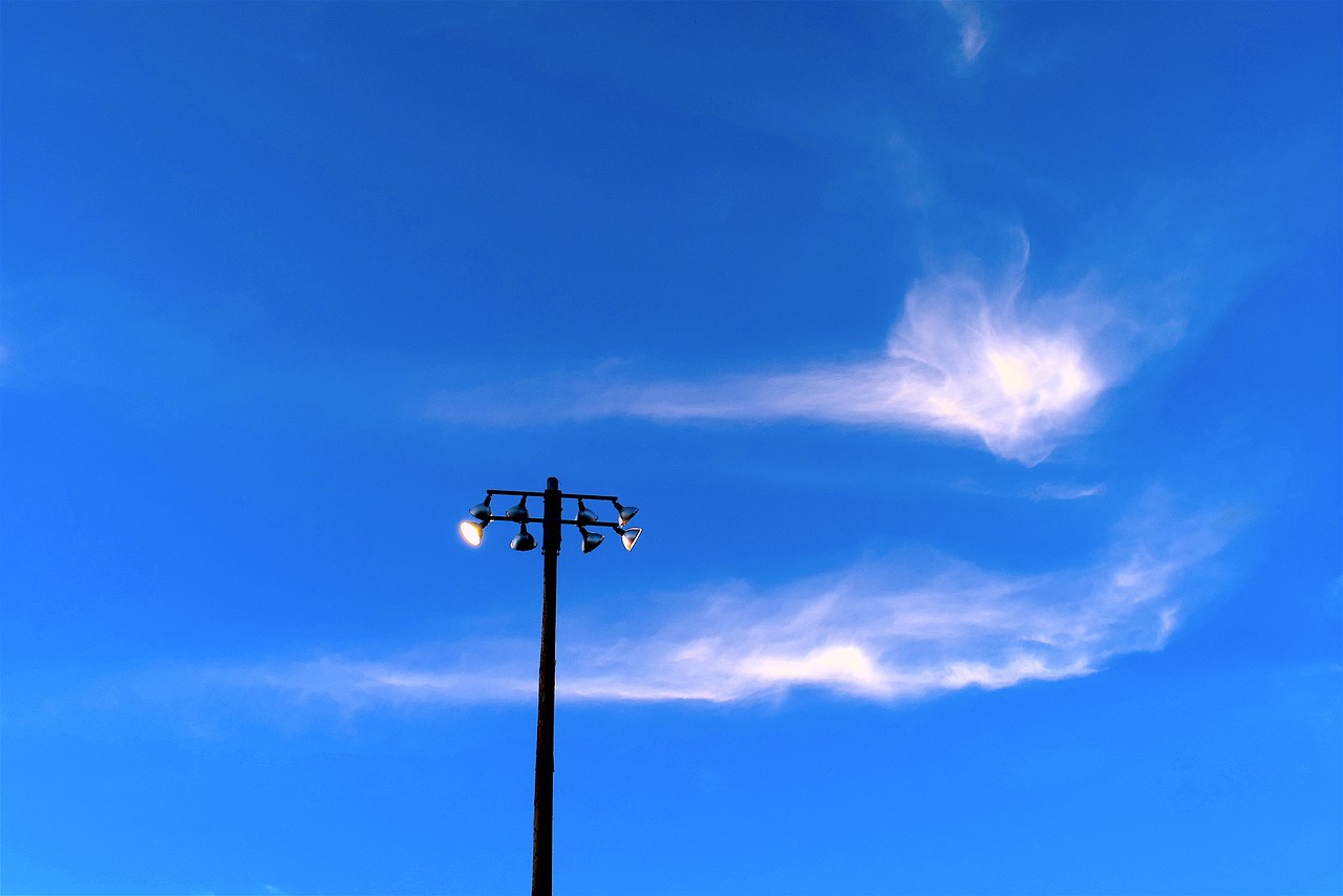 light pole sky clouds free photo