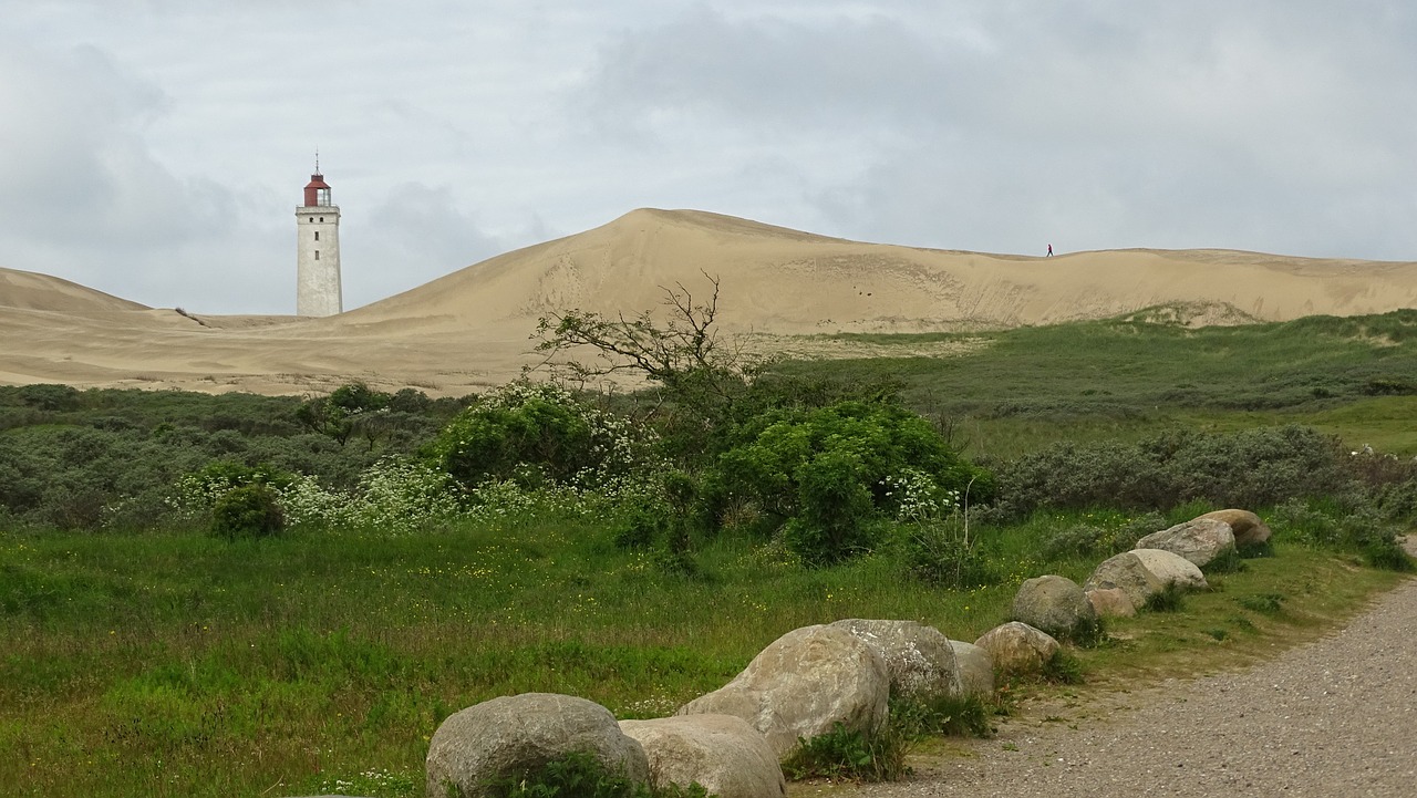 lighthouse dunes north sea free photo