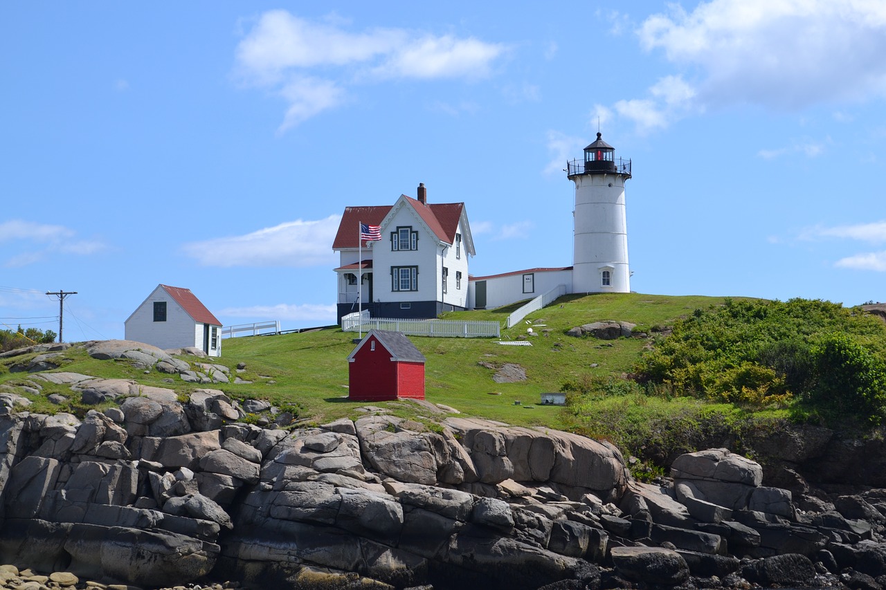 lighthouse coastline beacon free photo