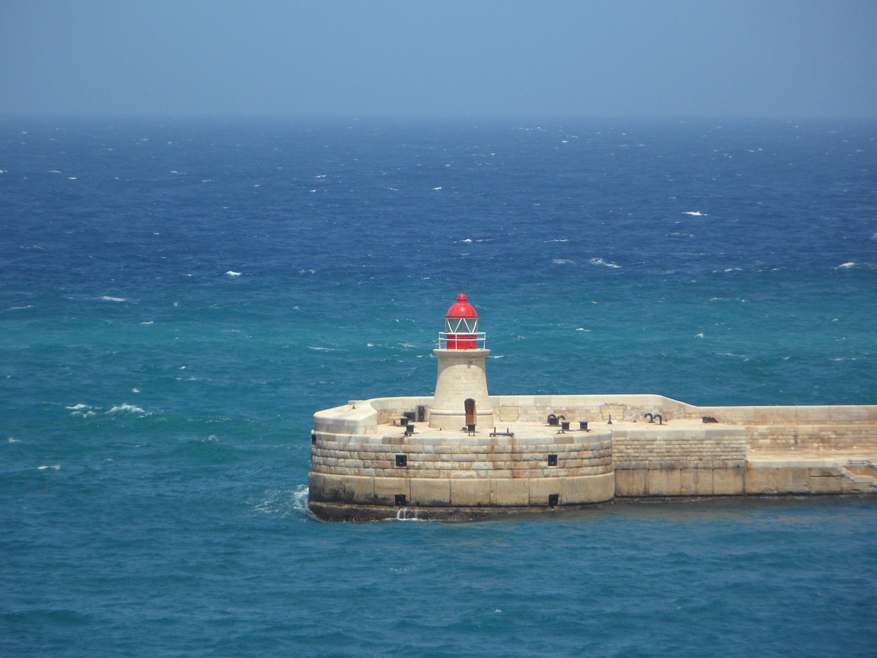 lighthouse water sea free photo