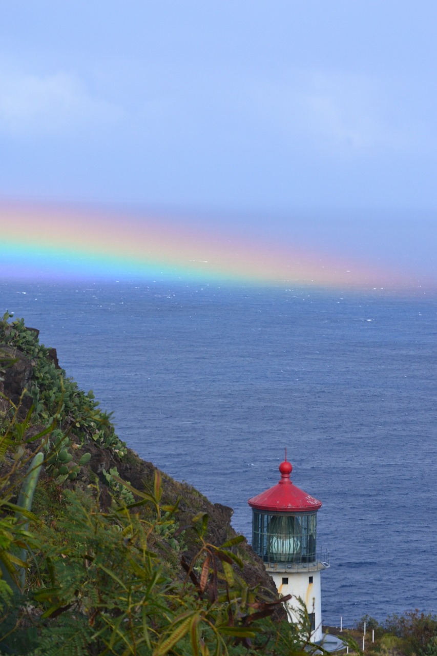 lighthouse rainbow ocean free photo