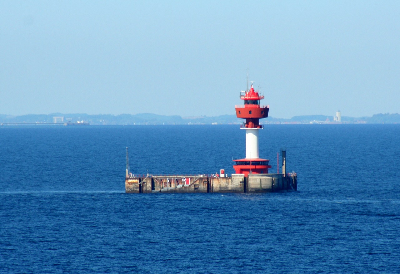 lighthouse water sea free photo