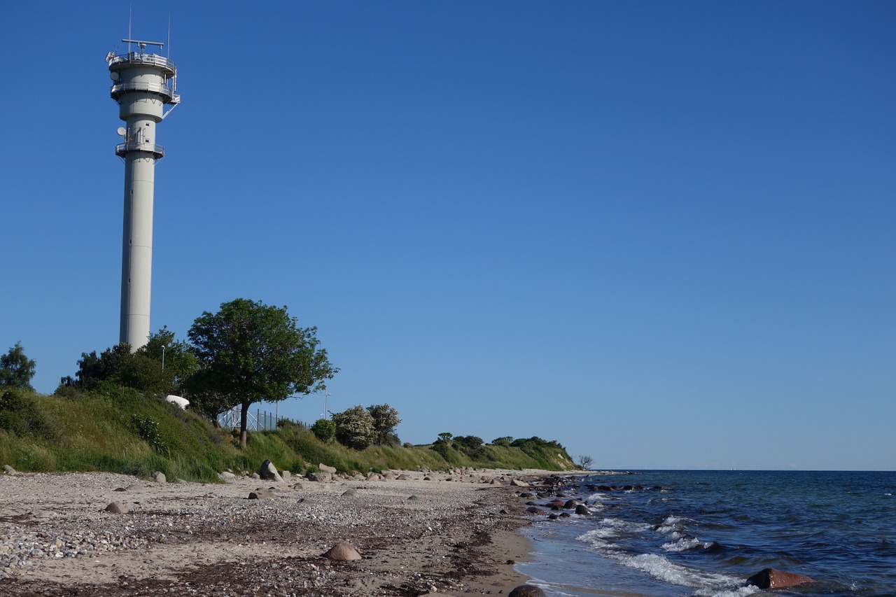 lighthouse coast sky free photo