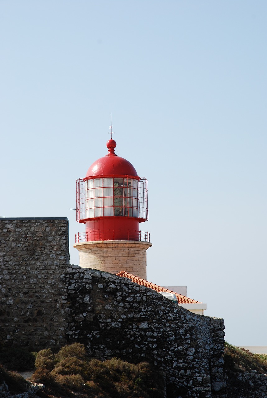 lighthouse algarve sky free photo