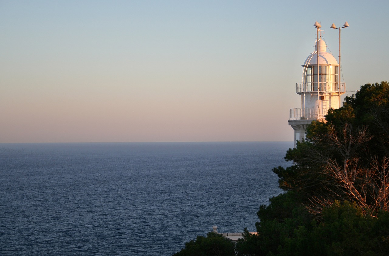 lighthouse sea cliffs free photo