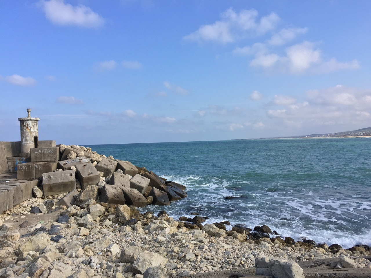 lighthouse rocks seashore free photo