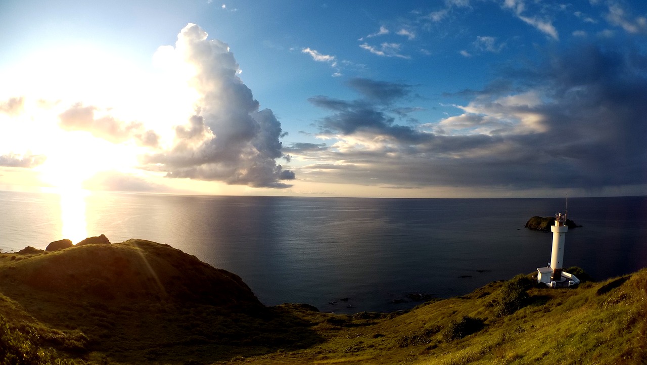 lighthouse sea sky free photo