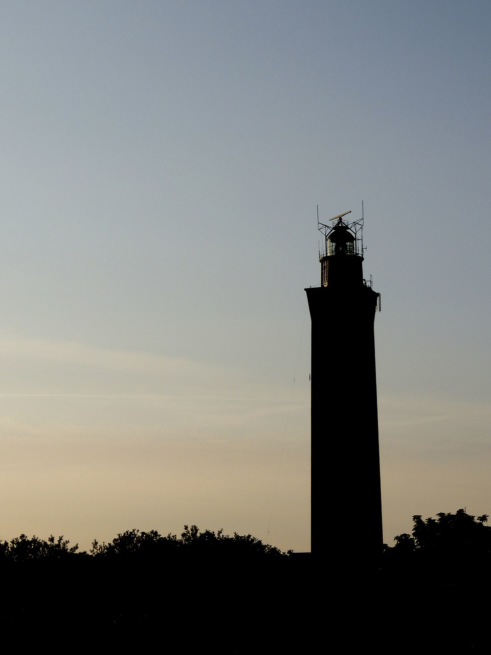 lighthouse sunset evening free photo