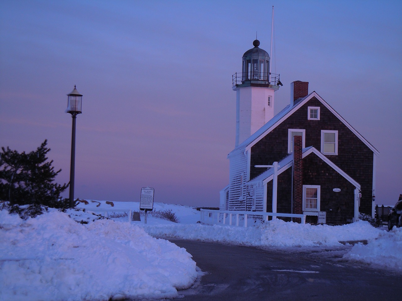 lighthouse winter snow free photo