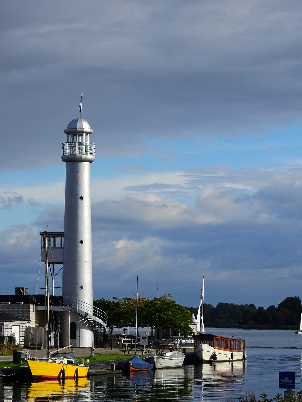 lighthouse water lake free photo