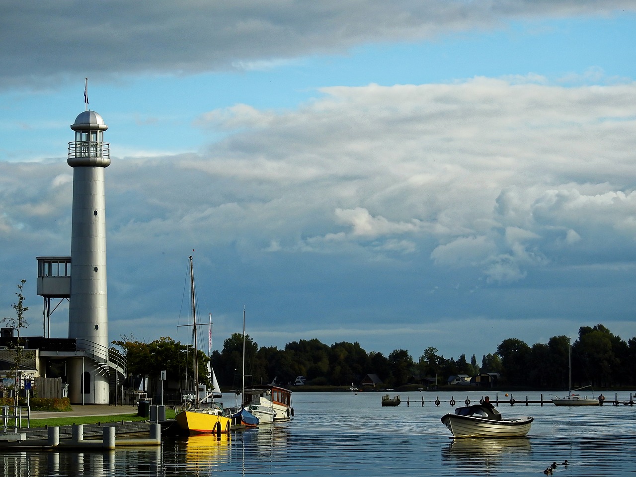 lighthouse water lake free photo