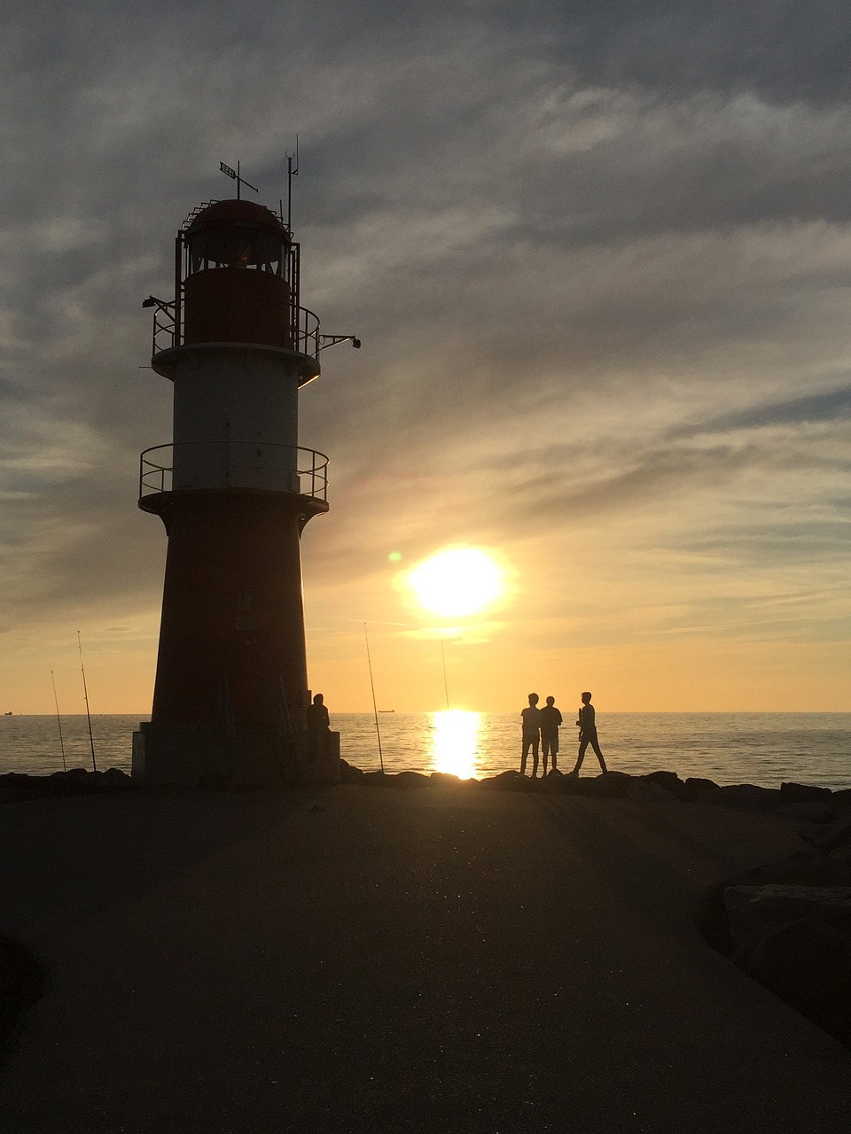 lighthouse sunset coast free photo