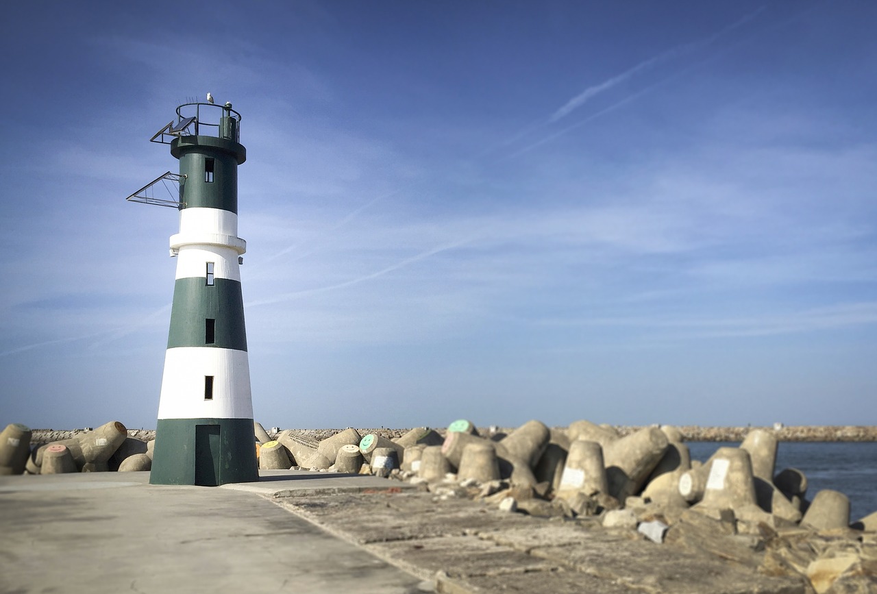 lighthouse sea sky free photo