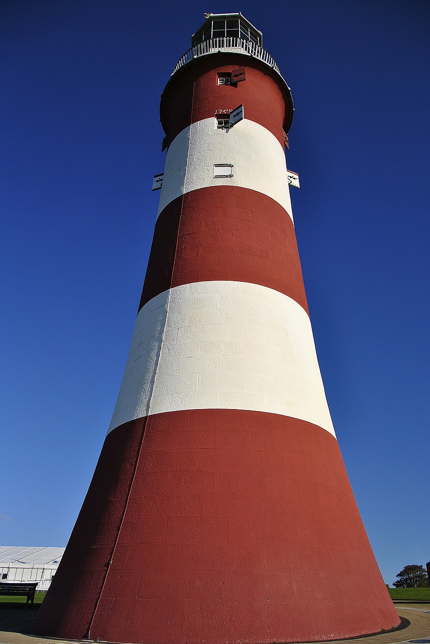 lighthouse seaside blue sky free photo